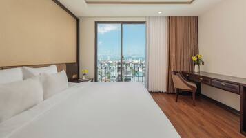 Premium bedding, down comforters, memory foam beds, minibar
