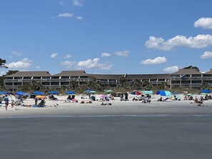 On the beach, sun loungers, beach towels