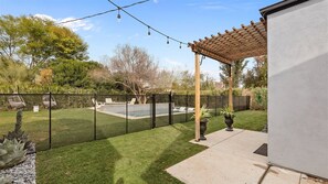 Property grounds - Stylish Retreat: Heated Pool w/ Jets, Putting Green & Outdoor Kitchen (Phoenix)