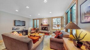 Flat-screen TV, fireplace