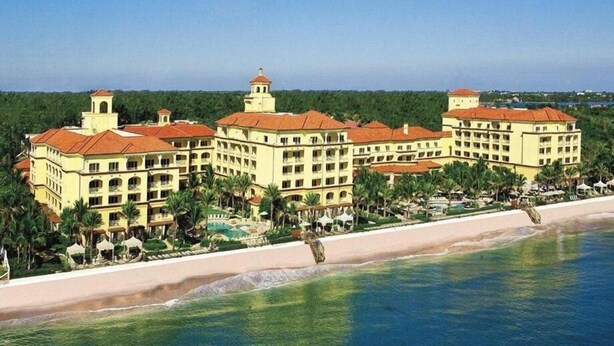 A resort with multiple buildings, a beach, and a pool area. - ON HYPOLUXO ISLAND, Incredible Property  - Walk to Beach (Lantana)