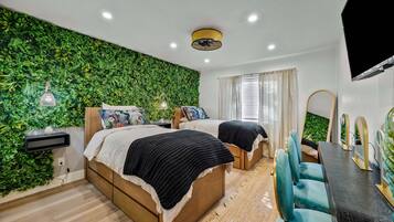 2 bedrooms, desk, iron/ironing board, travel crib