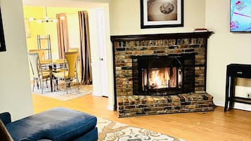 Smart TV, fireplace, books