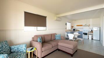 Comfort Cabin, 1 Queen Bed, Sea View | Living area | 80-cm flat-screen TV with digital channels, TV, DVD player