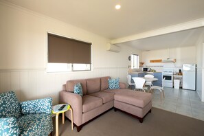 Comfort Cabin, 1 Queen Bed, Sea View | Living area | 80-cm flat-screen TV with digital channels, TV, DVD player