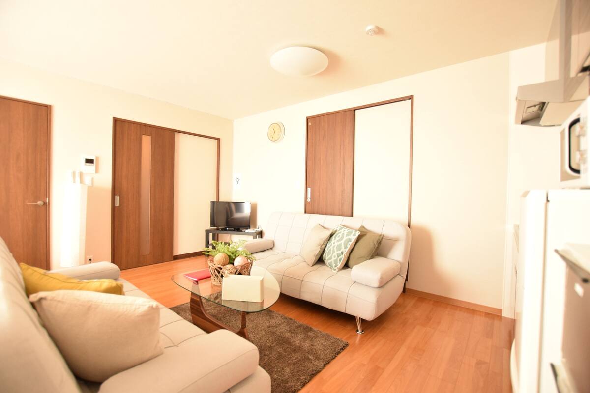 Apartment, 1 Bedroom ( 801 ) | Living area | Flat-screen TV