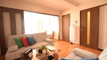 Apartment, 1 Bedroom ( 701 ) | Living area | Flat-screen TV