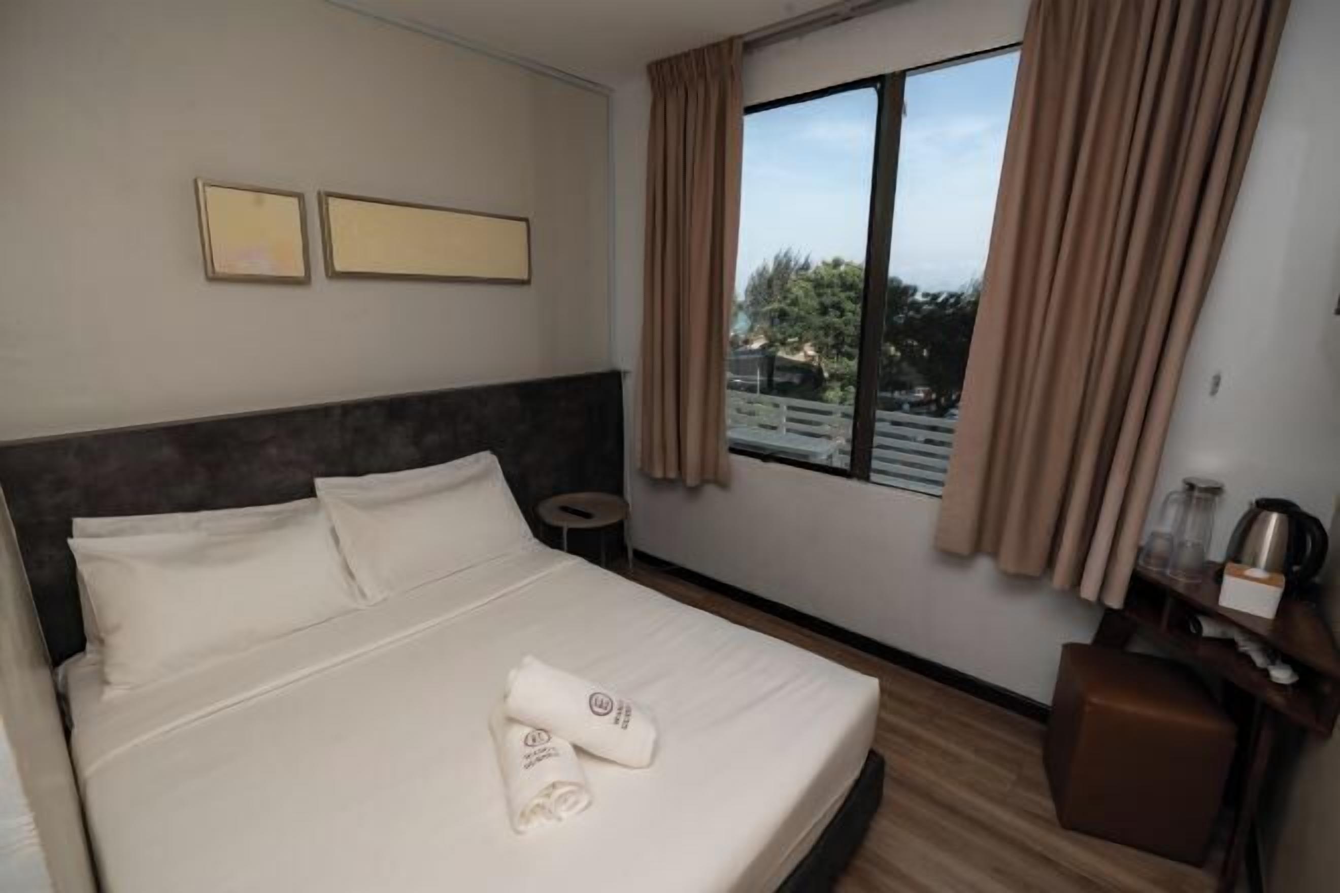 Desk, blackout curtains, free WiFi, bed sheets