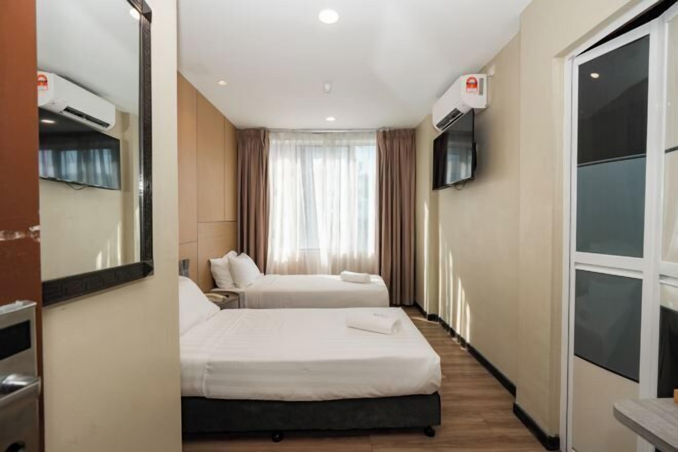 Desk, blackout curtains, free WiFi, bed sheets