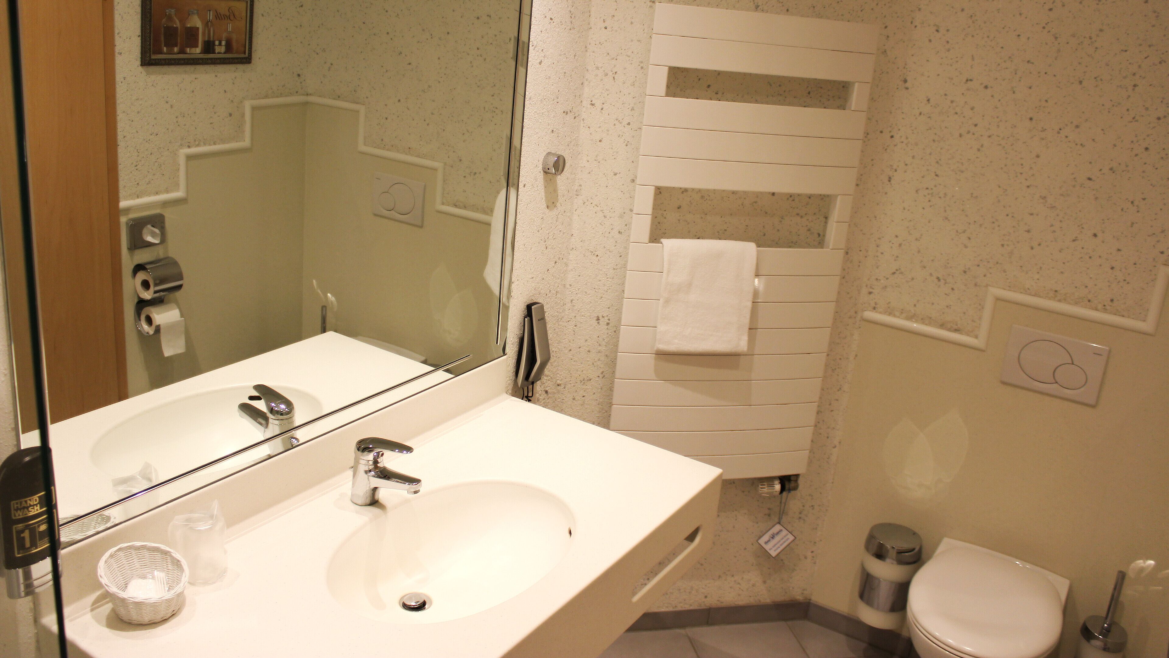 comfort single room | bathroom | deep-soaking bathtub, hair dryer, towels