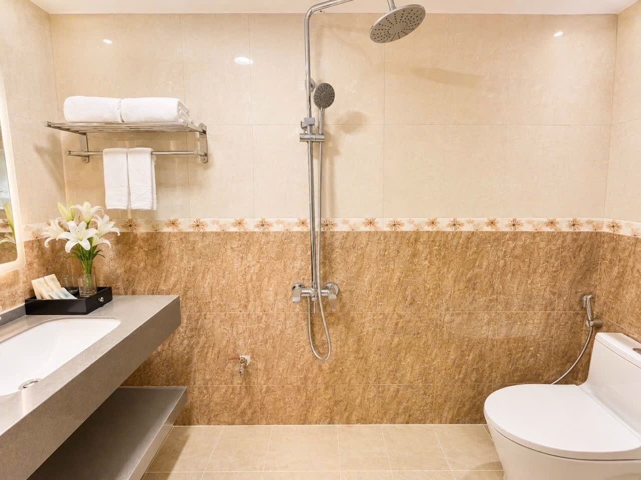 Shower, free toiletries, hair dryer, slippers