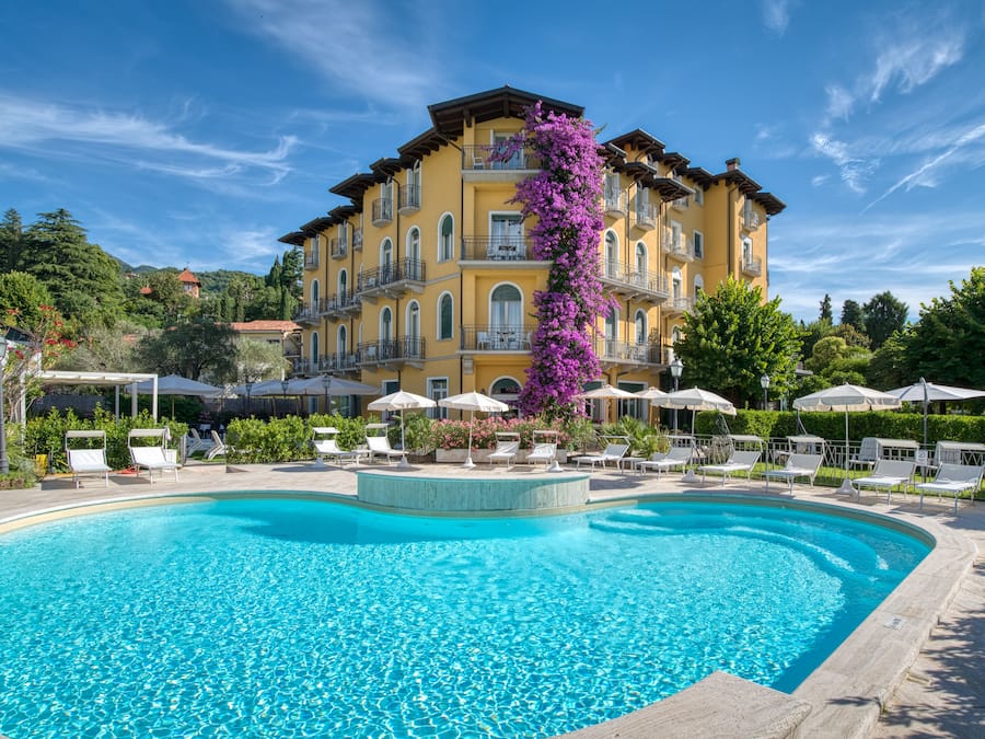 Seasonal outdoor pool, open 9:00 AM to 7:00 PM, pool umbrellas