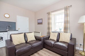 Cottage | Living area | Flat-screen TV, DVD player, books - 1 The Byre, Cromarty (Cromarty)