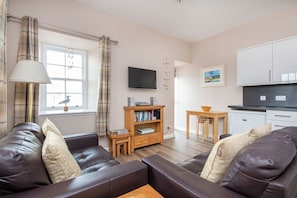 Cottage | Living room | Flat-screen TV, DVD player, books - 1 The Byre, Cromarty (Cromarty)