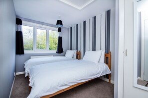 3 slaapkamers, een laptopwerkplek, een strijkplank/strijkijzer