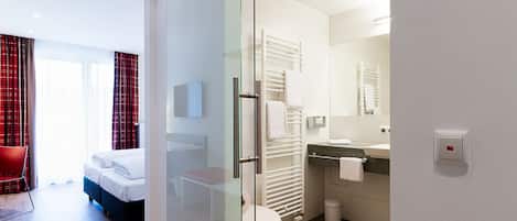 Standard Double Room | Bathroom | Shower, hair dryer, towels