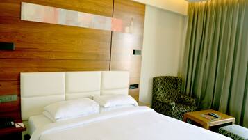 Habitación Elite | Minibar, caja de seguridad en la habitación, wifi gratis y ropa de cama