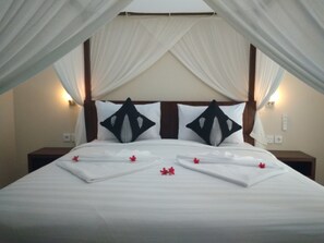 Deluxe Double Room, 1 Double Bed, Smoking | Minibar, desk, soundproofing, iron/ironing board - Kartika Bungalows (Ubud)