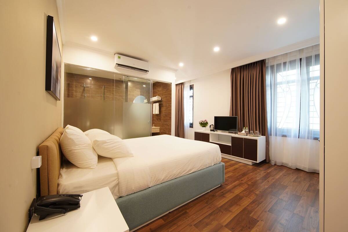 Habitación de lujo | Minibar, escritorio, cortinas opacas y sistema de insonorización