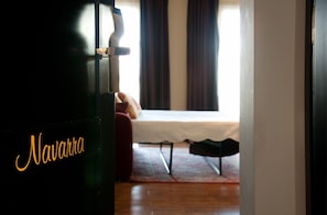 Habitació triple superior | Escriptori, planxa i posts de planxar i bressols gratuïts