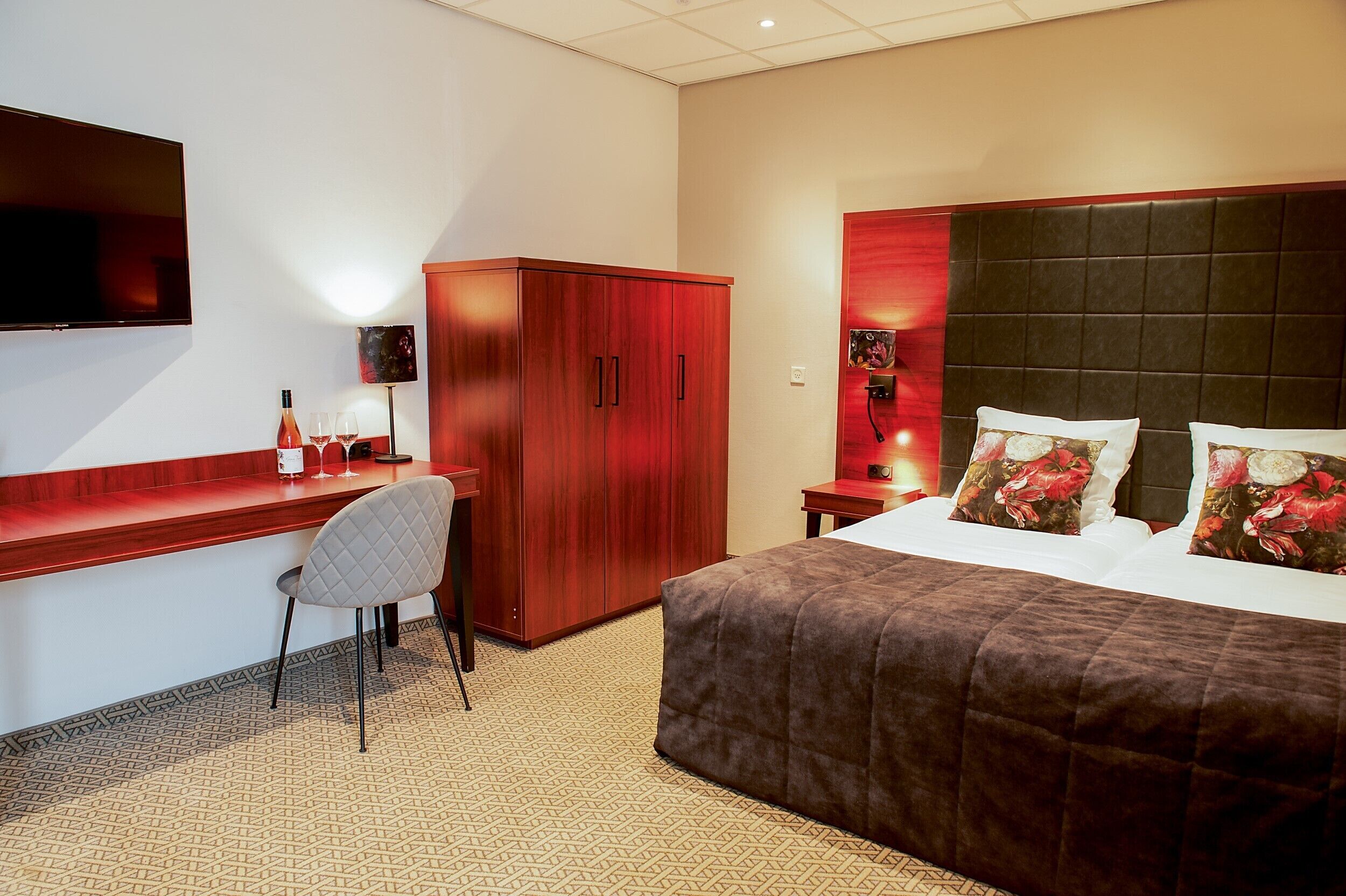 junior suite | in-room safe, desk, blackout curtains, iron/ironing board