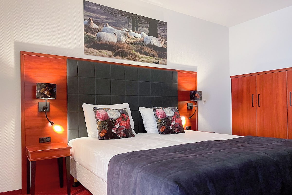In-room safe, desk, blackout curtains, iron/ironing board