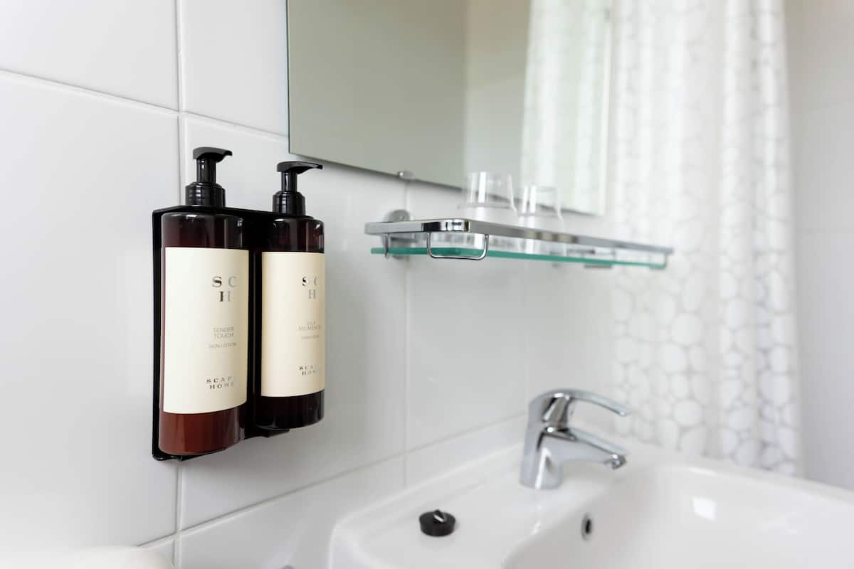 eco-friendly toiletries, hair dryer, towels