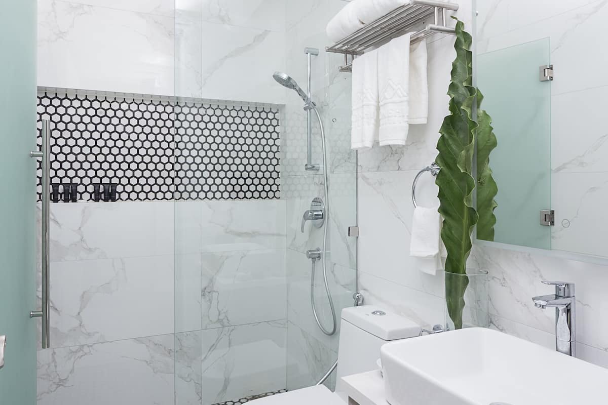 junior suite, balcony, city view | bathroom | hair dryer, bathrobes, slippers, bidet