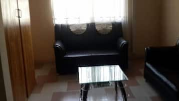 Suite | Zona de estar | Una televisión de pantalla plana