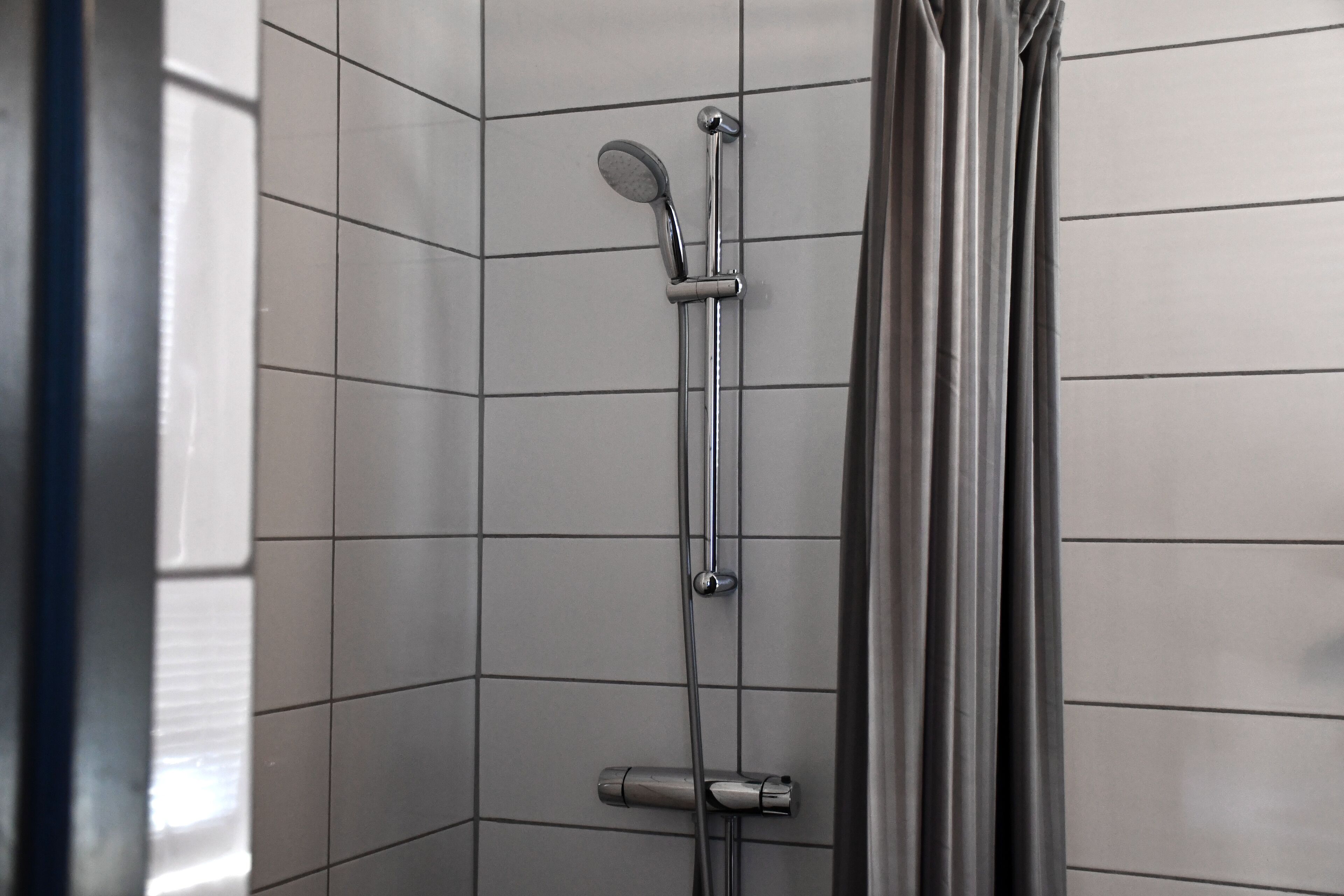 twin room | bathroom | shower, free toiletries, hair dryer, towels