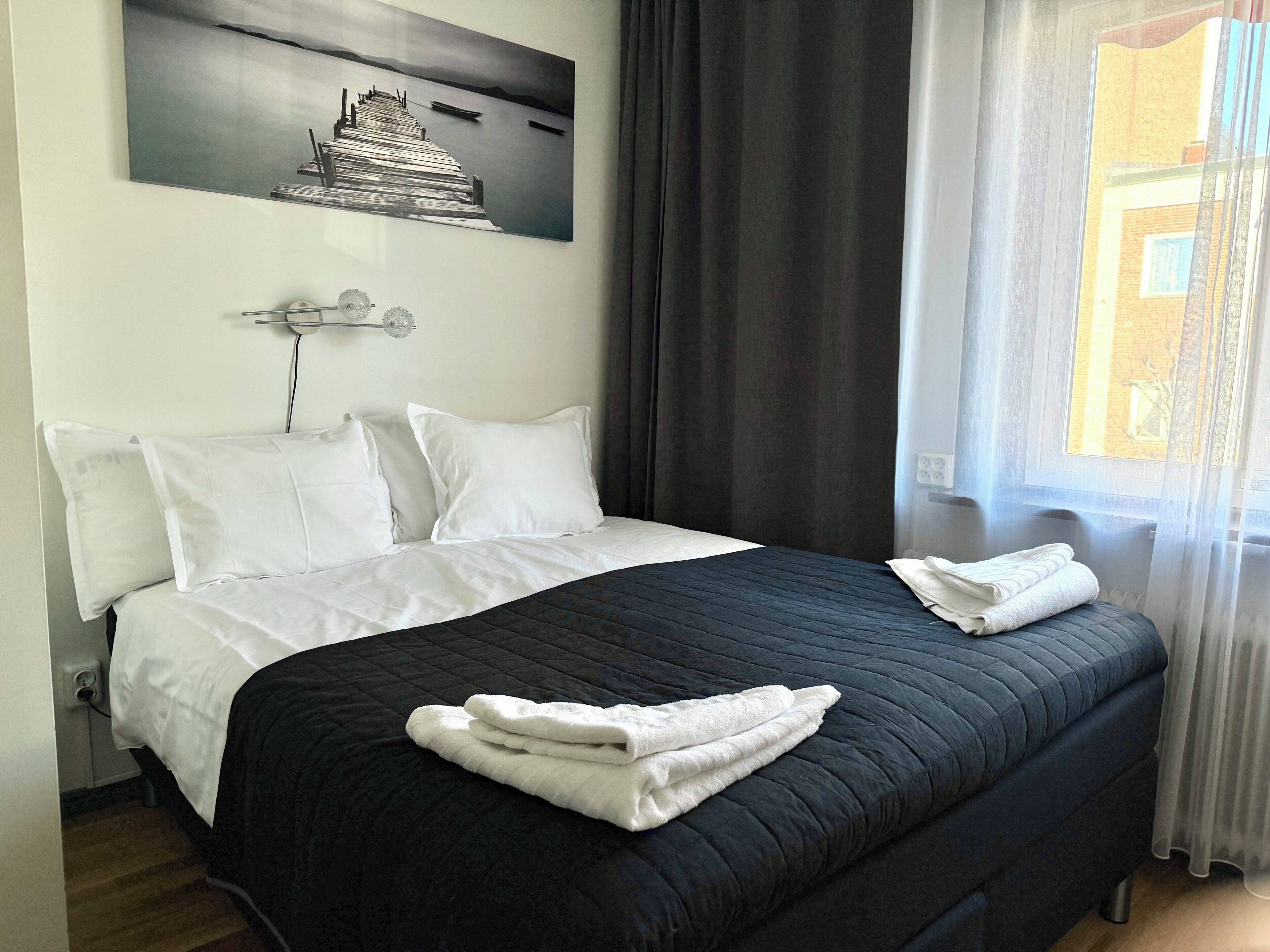 Økonomi-dobbeltrom | Sengetøy av topp kvalitet, safe på rommet og blendingsgardiner