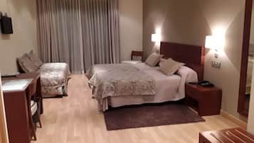Desk, laptop workspace, blackout drapes, free cribs/infant beds