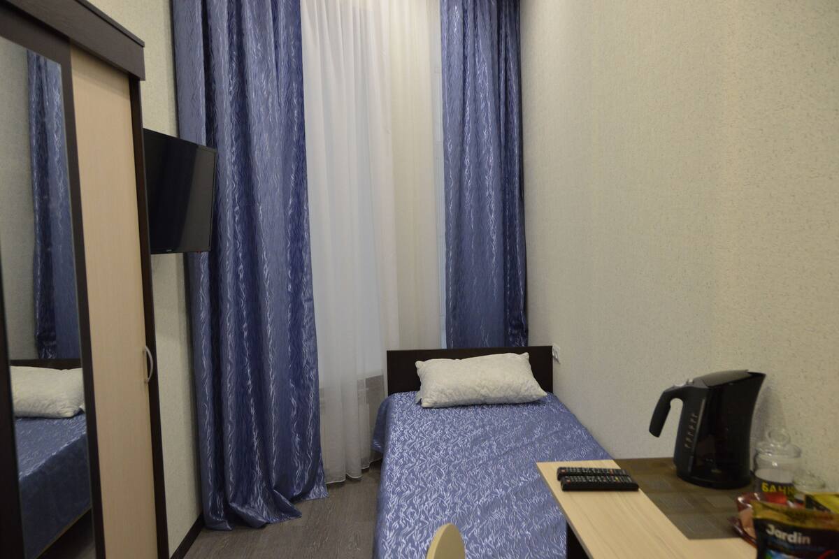 Desk, blackout curtains, soundproofing, iron/ironing board