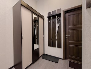 Desk, blackout curtains, soundproofing, iron/ironing board