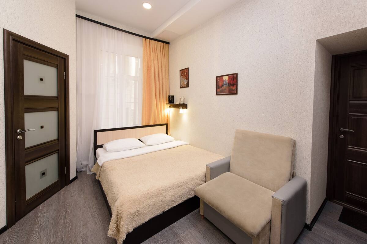 Desk, blackout curtains, soundproofing, iron/ironing board