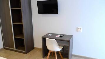 Desk, blackout drapes, soundproofing, free WiFi