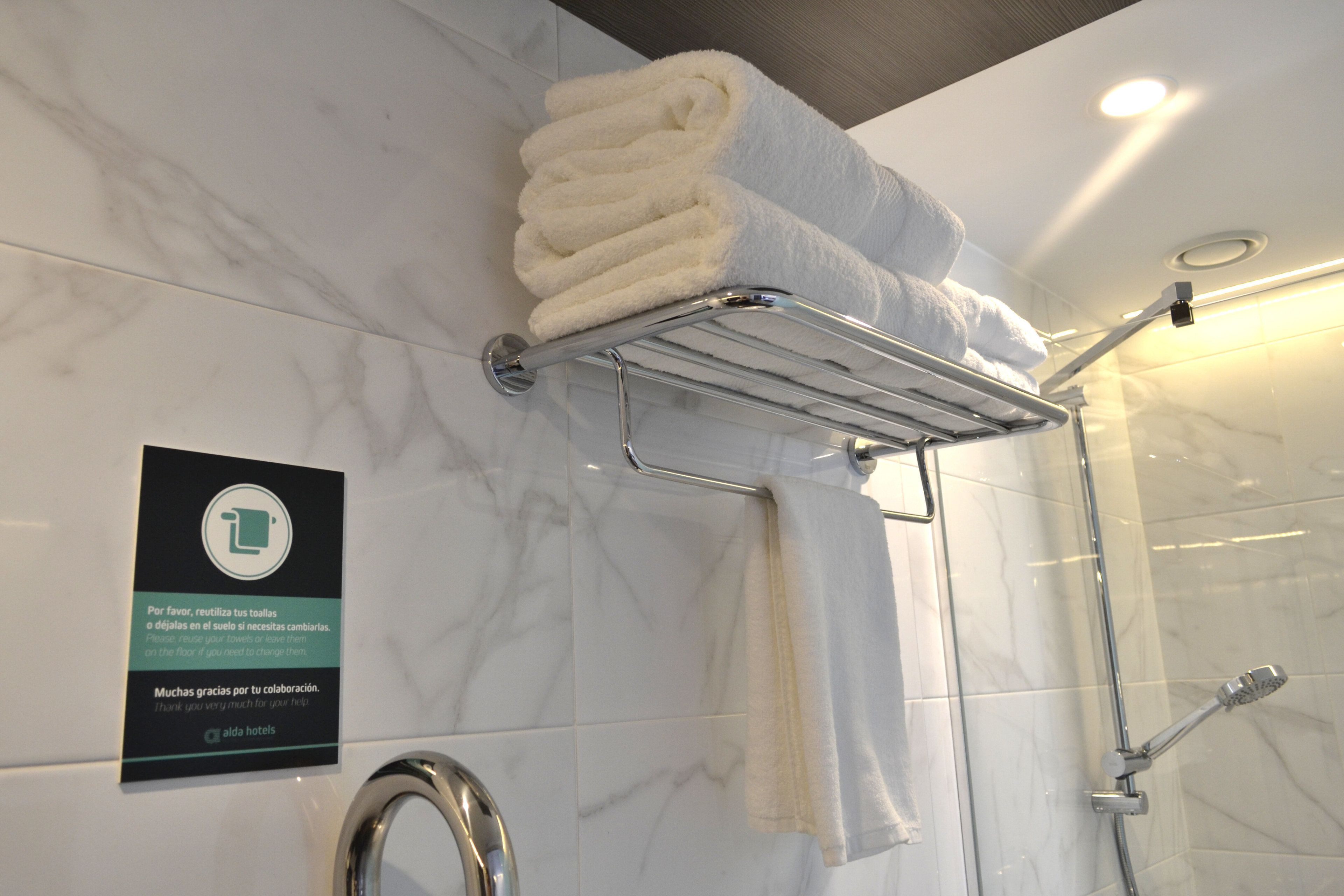 economy twin room | bathroom | hair dryer, towels