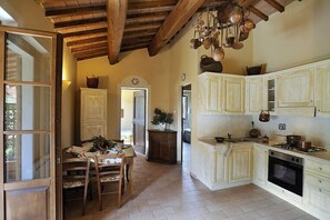 Apartment, 2 Bedrooms, Balcony | Private kitchen | Full-size fridge, oven, stovetop, coffee/tea maker - Agriturismo Il Corniolo (Corciano)