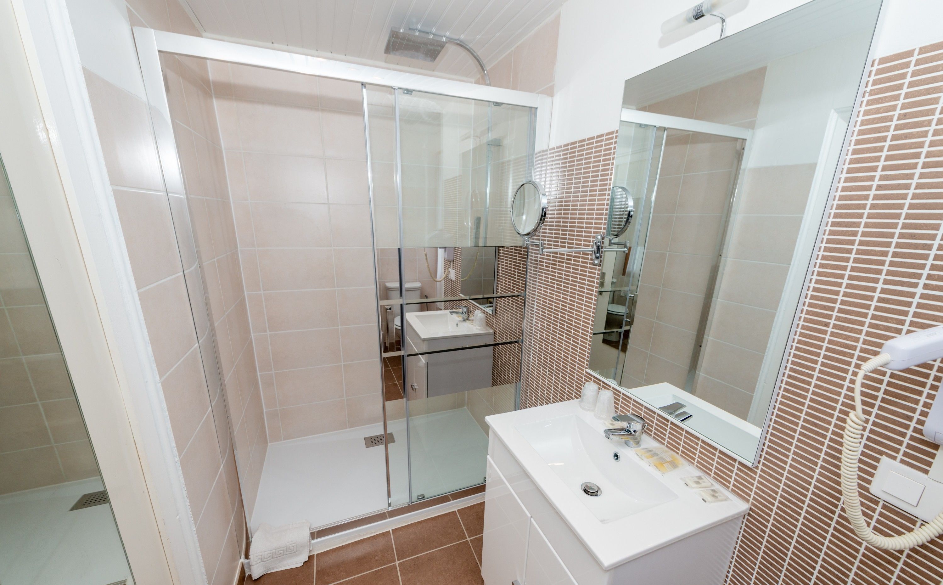 deep-soaking bathtub, free toiletries, hair dryer, towels