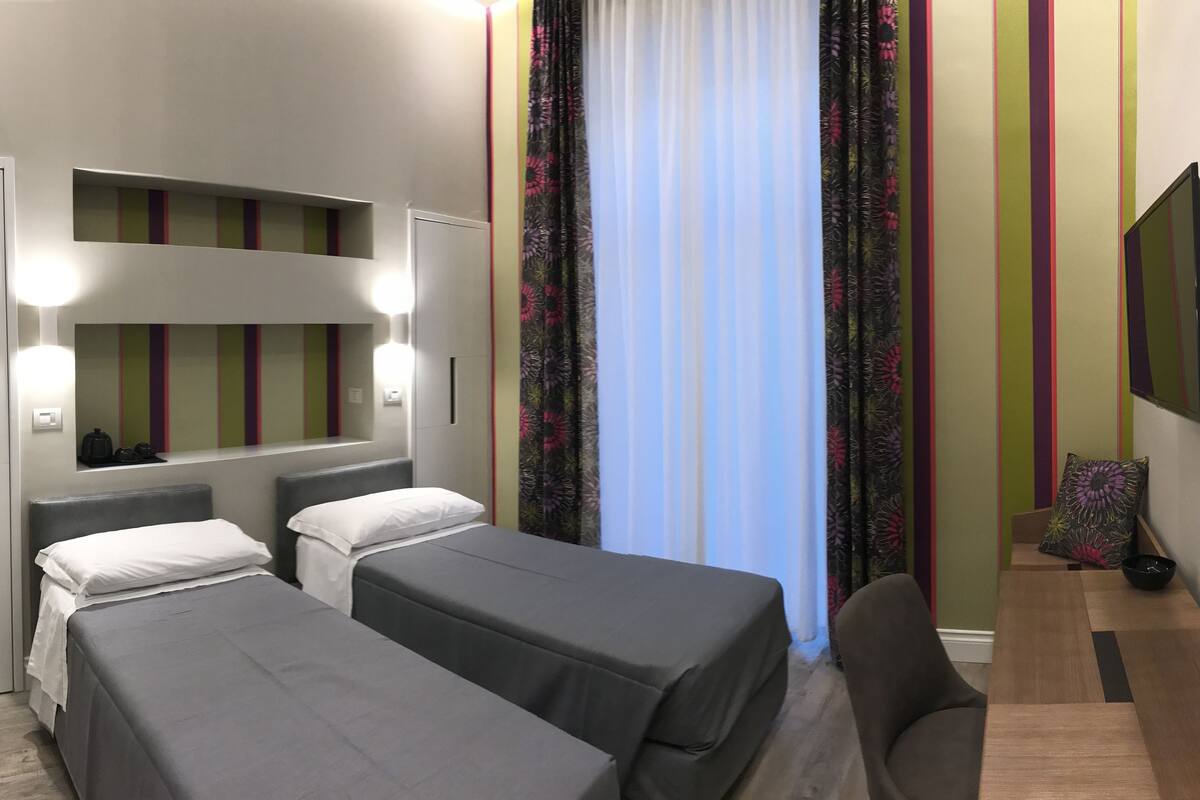Deluxe Double or Twin Room | Minibar, desk, WiFi (free), individually furnished