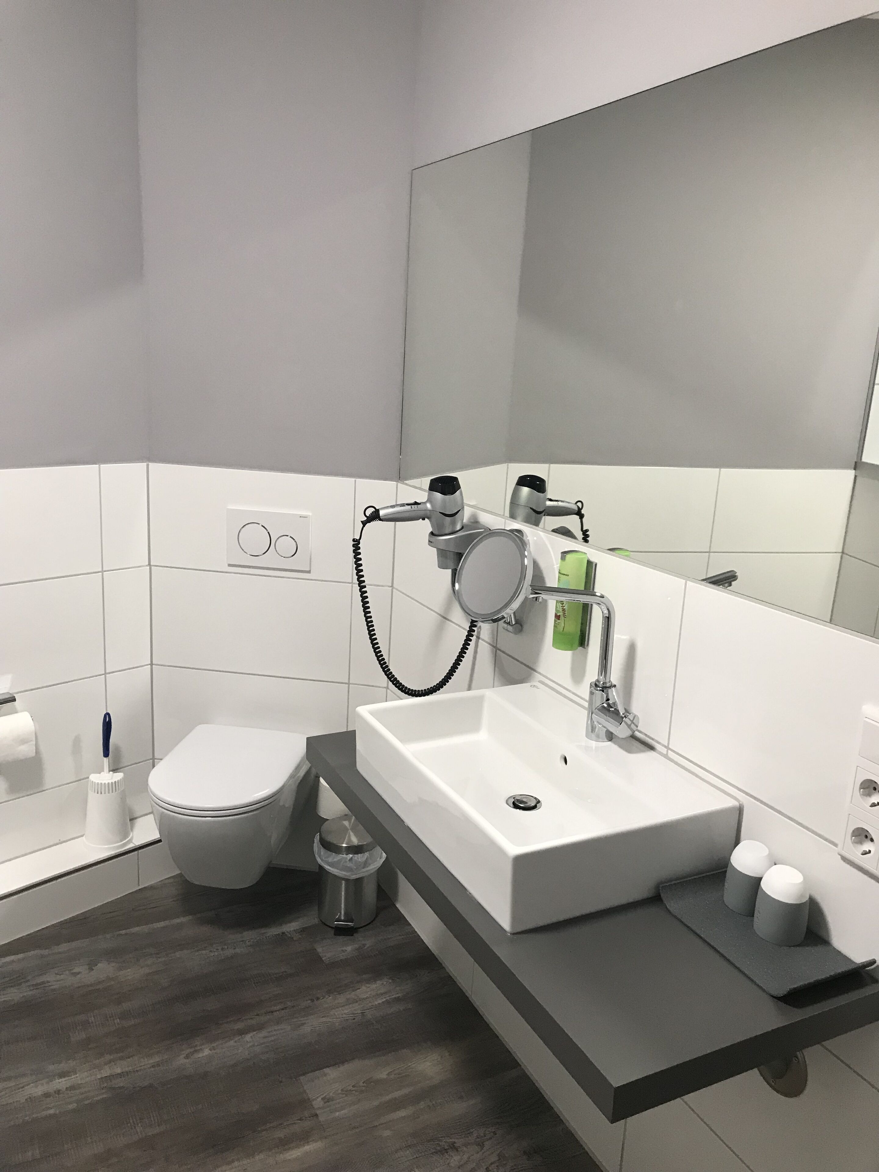 deluxe double room, 1 king bed | bathroom | shower, free toiletries, hair dryer