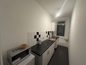 Tomannsrom, delt bad | Delt kjøkken | Vannkoker