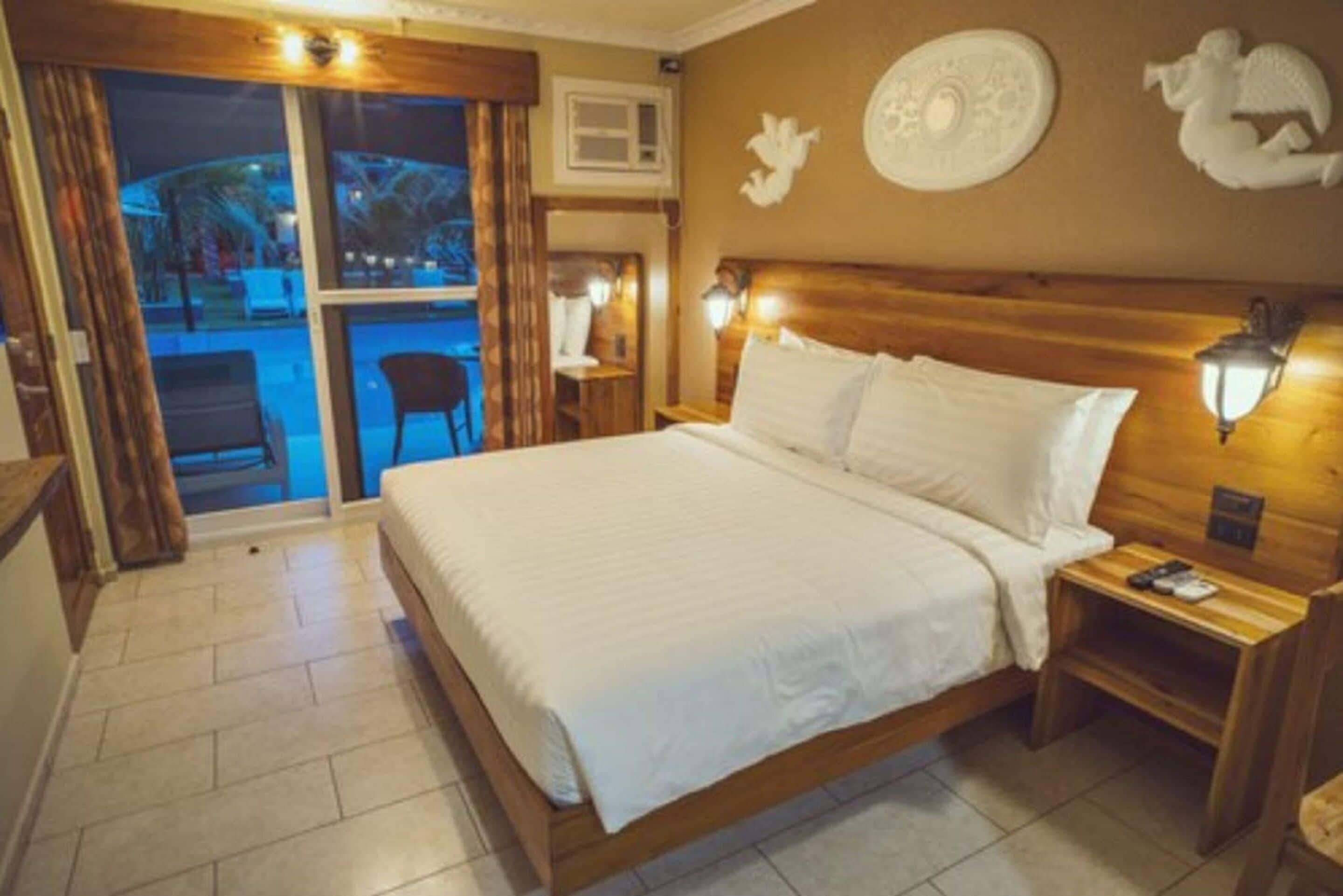 Deluxe Double Room, 1 King Bed, Non Smoking, Pool Access | 1 bedroom, memory foam beds, in-room safe, blackout drapes