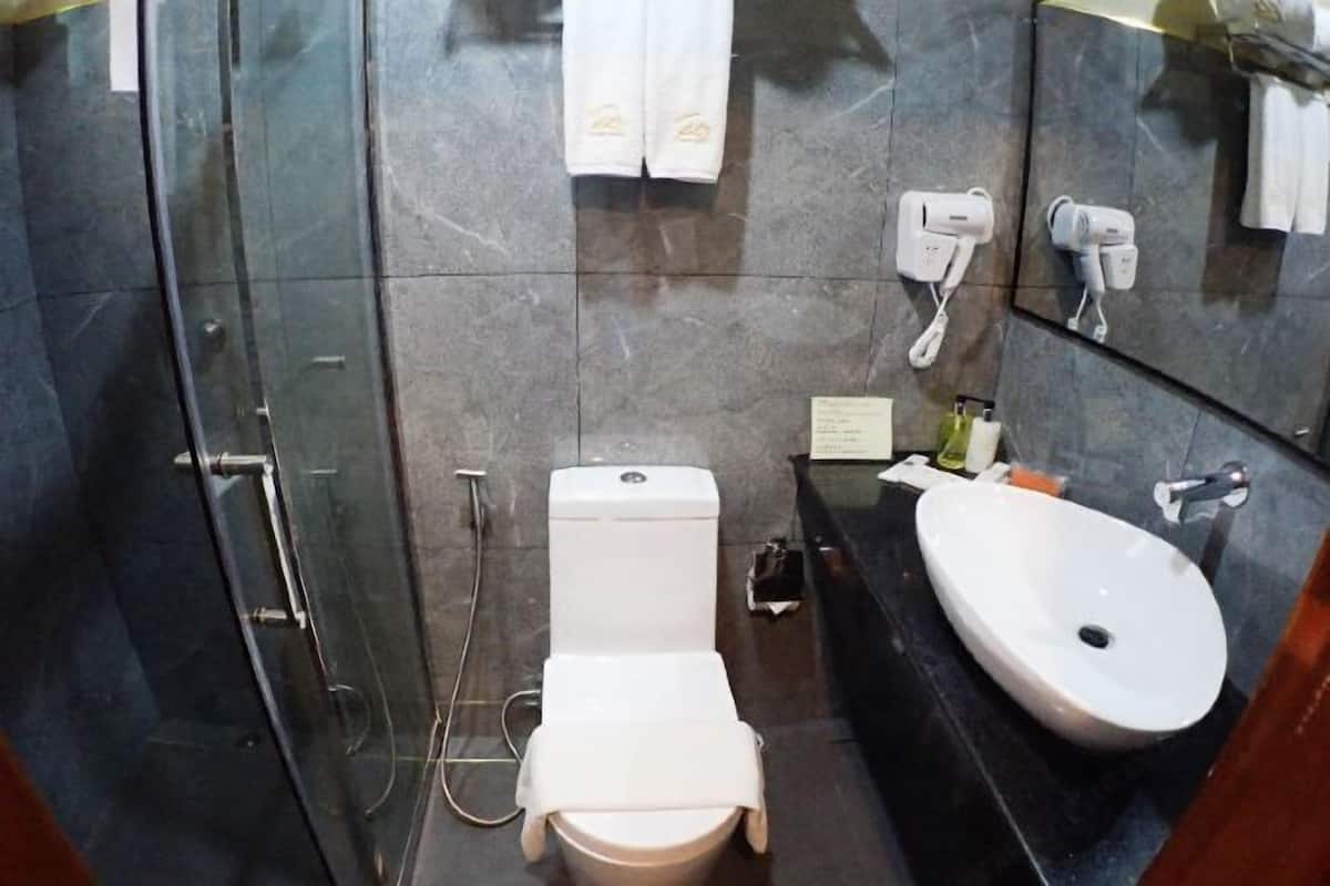 Bathroom | Shower, free toiletries, bathrobes, towels