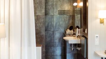 Suite | Bathroom | Designer toiletries, hair dryer, towels