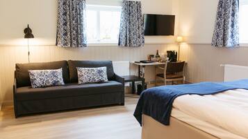 Family Room | Minibar, blackout drapes, cribs/infant beds, rollaway beds