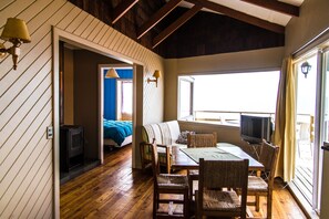 Family Cabin, Lake View (Palafito) | In-room dining - Hotel y Cabañas Puerto Pilar (Puerto Varas)
