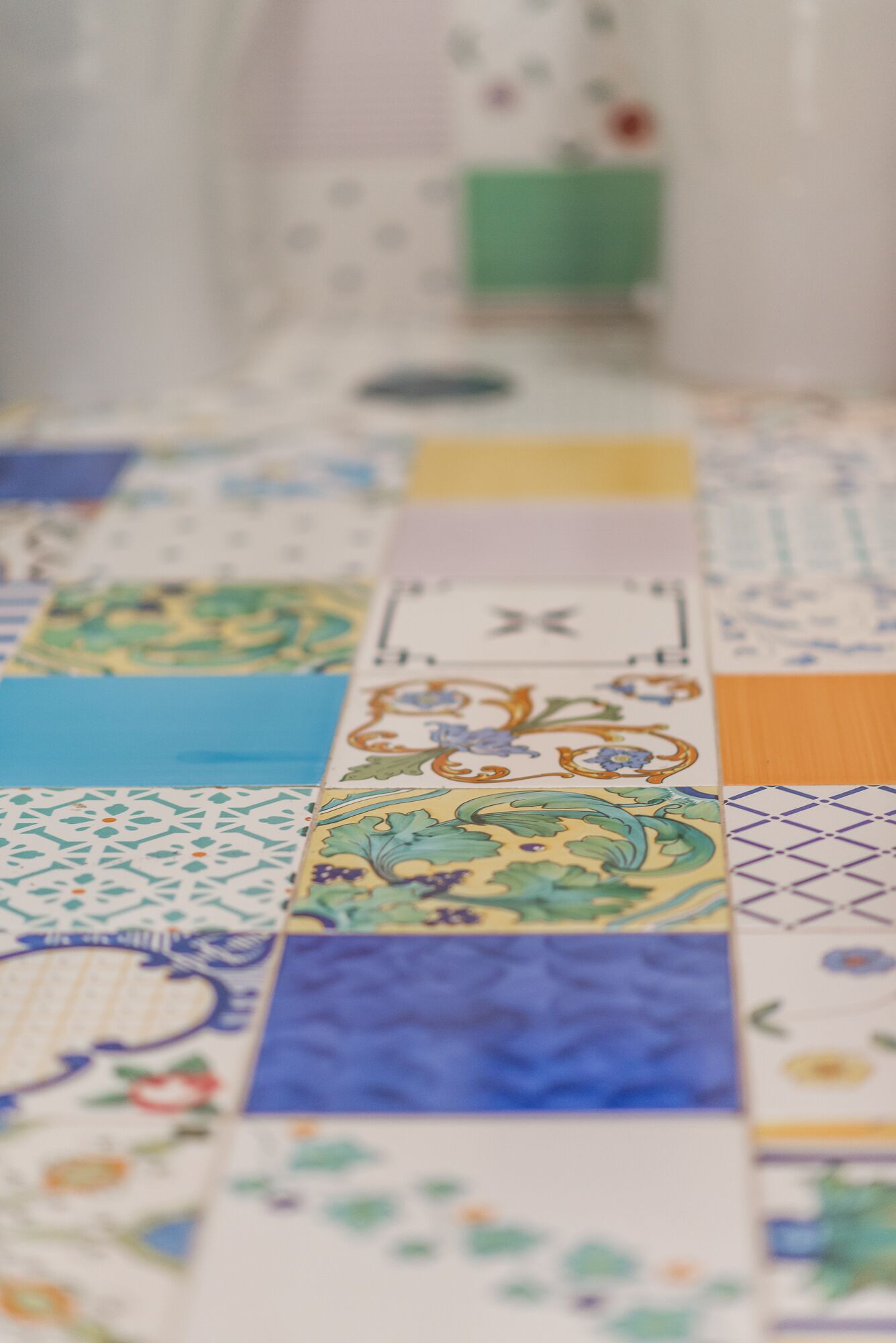 A close-up of a board game with various colorful tiles.