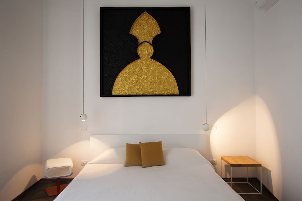Premium bedding, down duvets, memory-foam beds, desk