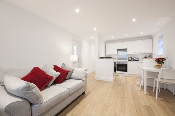Apartment C (Self Catering) | Living area | 45-inch flat-screen TV with satellite channels, TV